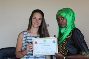 two volunteers showing participation certificates at Perspective Development Skills Charitable Organization