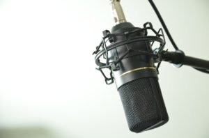 Voiceover dubbing act singing microphone