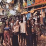 No Name free hostel volunteers and locals posing for a photo in Goa, India