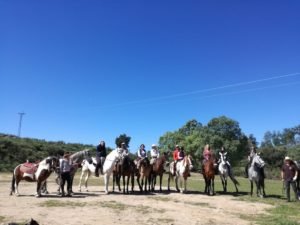 ecupasil ranch horses, members and volunteers during a horse expedition in natural horsemanship in Extrema Dura, Spain