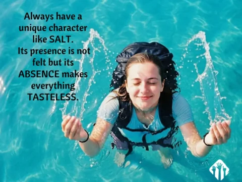 Young female backpacker smiling with eyes closed, standing in clear turquoise water with arms raised, enjoying the moment – inspirational quote about character and presence, featuring the metaphor of salt.