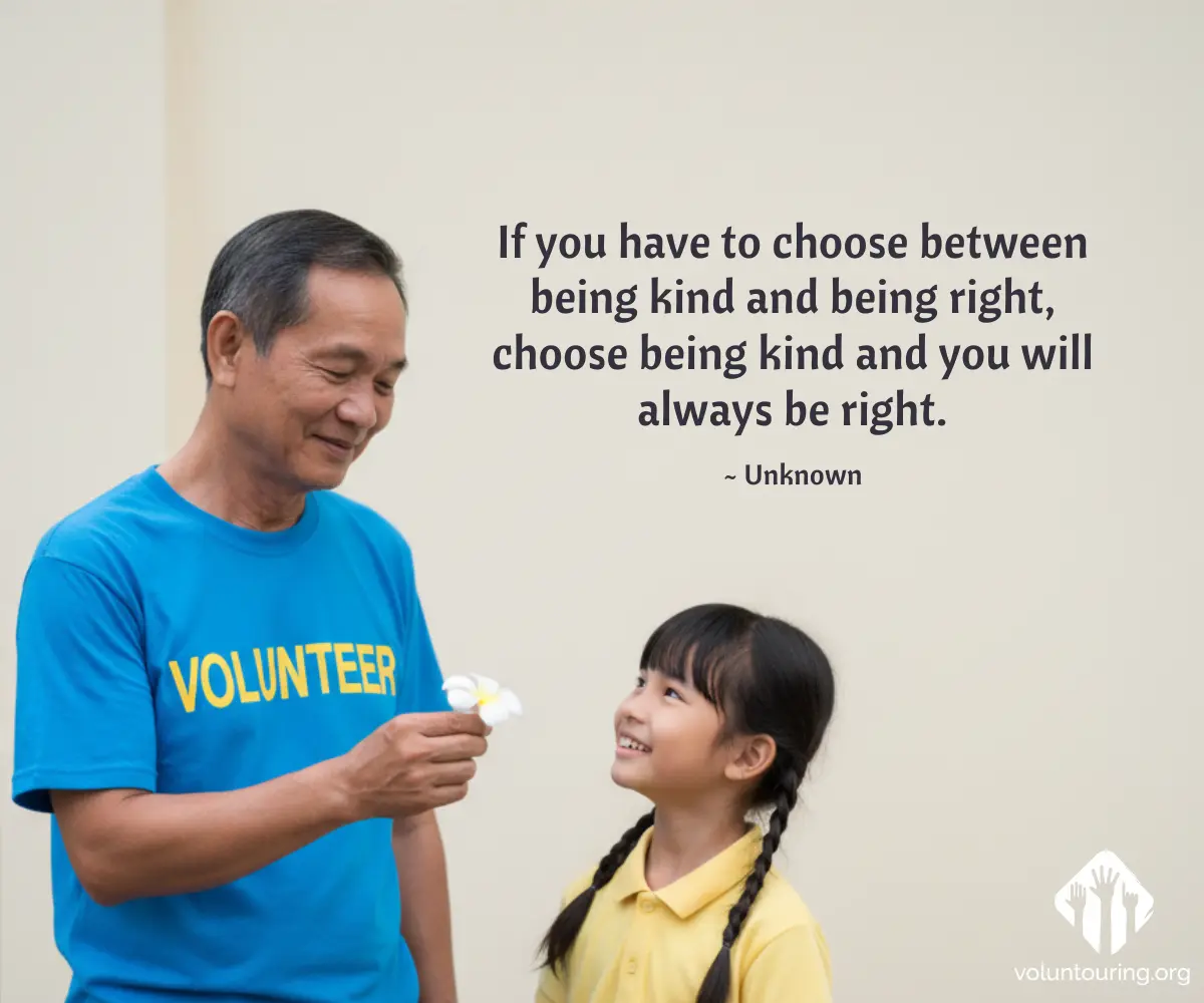 Smiling male volunteer in a blue “VOLUNTEER” shirt offering a white flower to a young girl with braids, neutral background. Quote reads, “If you have to choose between being kind and being right, choose being kind and you will always be right.”