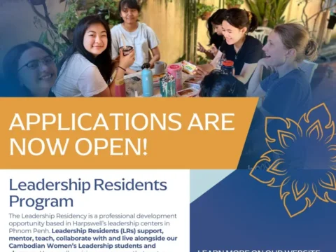 Group of diverse young women sharing a meal and smiling at Harpswell's leadership center in Phnom Penh, promoting the Leadership Residents Program with applications now open