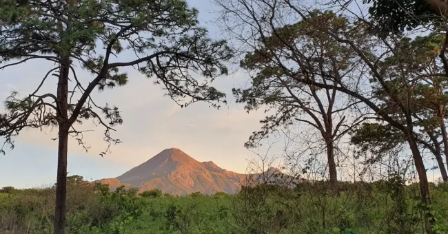 View of the Volcán de Fuego de Colima from the Roca de Hadas eco village in South Jalisco, Mexico.