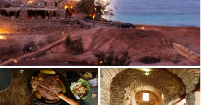 Castle Zaman stone buildings on a private Red Sea beach in South Sinai, Egypt. Slow food dinner table Seasonal team photo inside stone-arched dining room