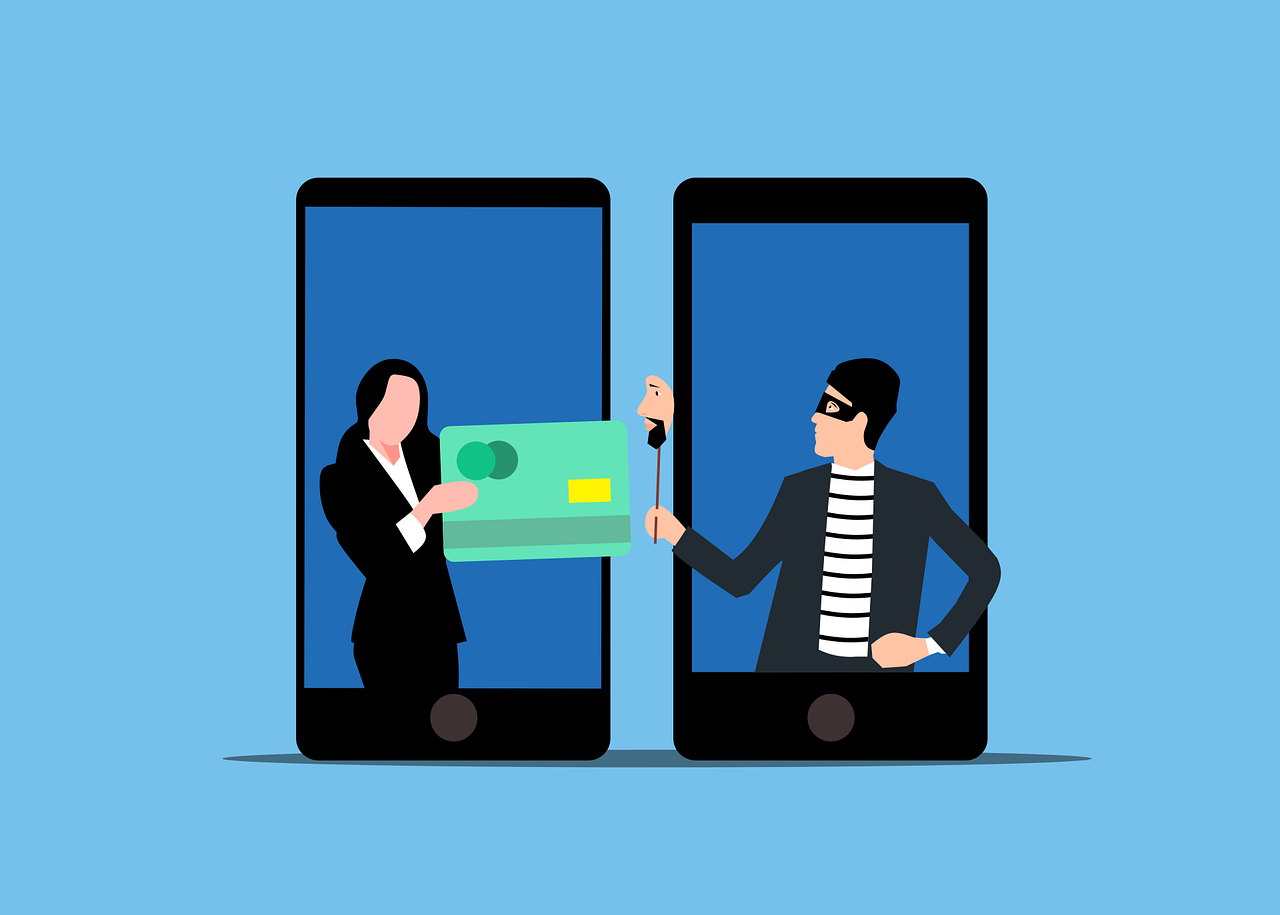 Illustration of an online scam between two smartphones, with a masked fraudster receiving a bank card from a woman, representing phishing, digital fraud, and fake funding email risks for nonprofits and volunteer projects.