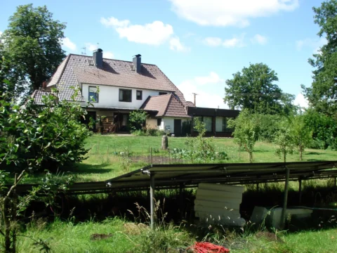 Countryside house with garden and solar panels in Nordhorn, Germany, where volunteers can help with gardening, animals, cleaning and home tasks in exchange for food and accommodation.