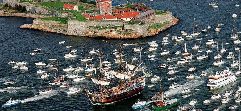 Götheborg historic sailing ship surrounded by boats near the coast of Gothenburg, Sweden, showing the maritime setting of a ship volunteering opportunity.