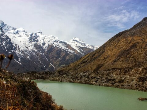 Mountain river valley in Rasuwa, Nepal, illustrating remote Himalayan terrain and disaster recovery challenges