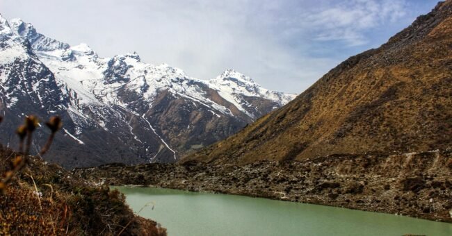 Mountain river valley in Rasuwa, Nepal, illustrating remote Himalayan terrain and disaster recovery challenges